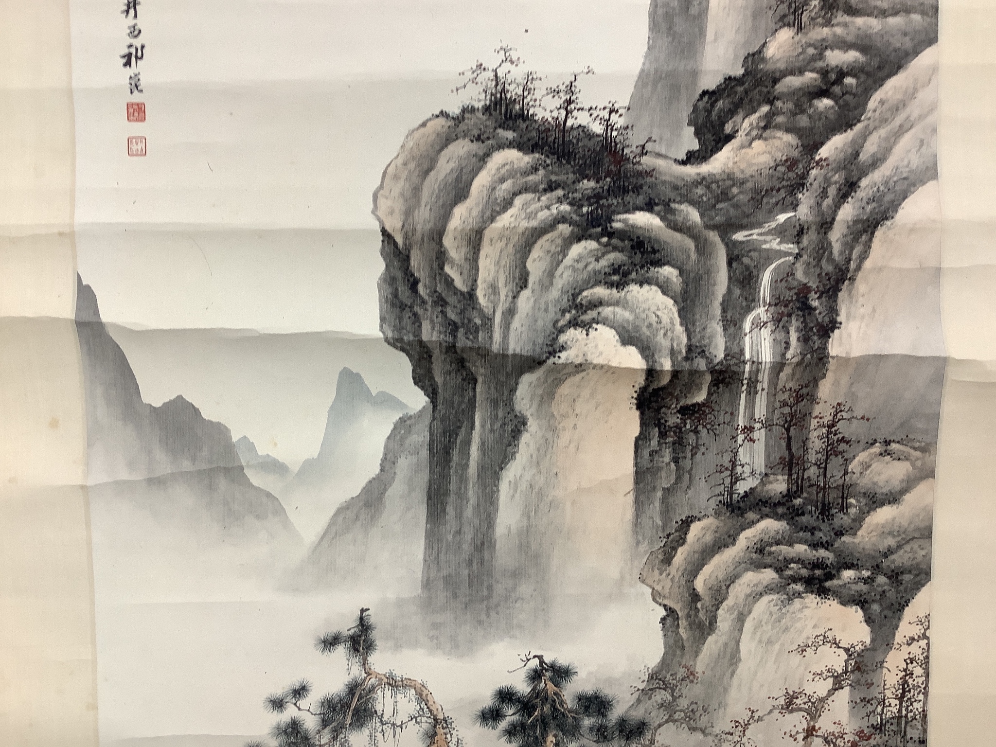 A Chinese scroll painting of a scholar seated in a mountainous river landscape, 20th century Image 94 cm X 45 cm